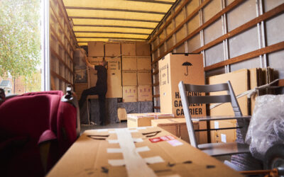 A moving truck laden with belongings