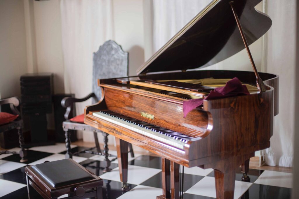 Grand piano on a checkered floor